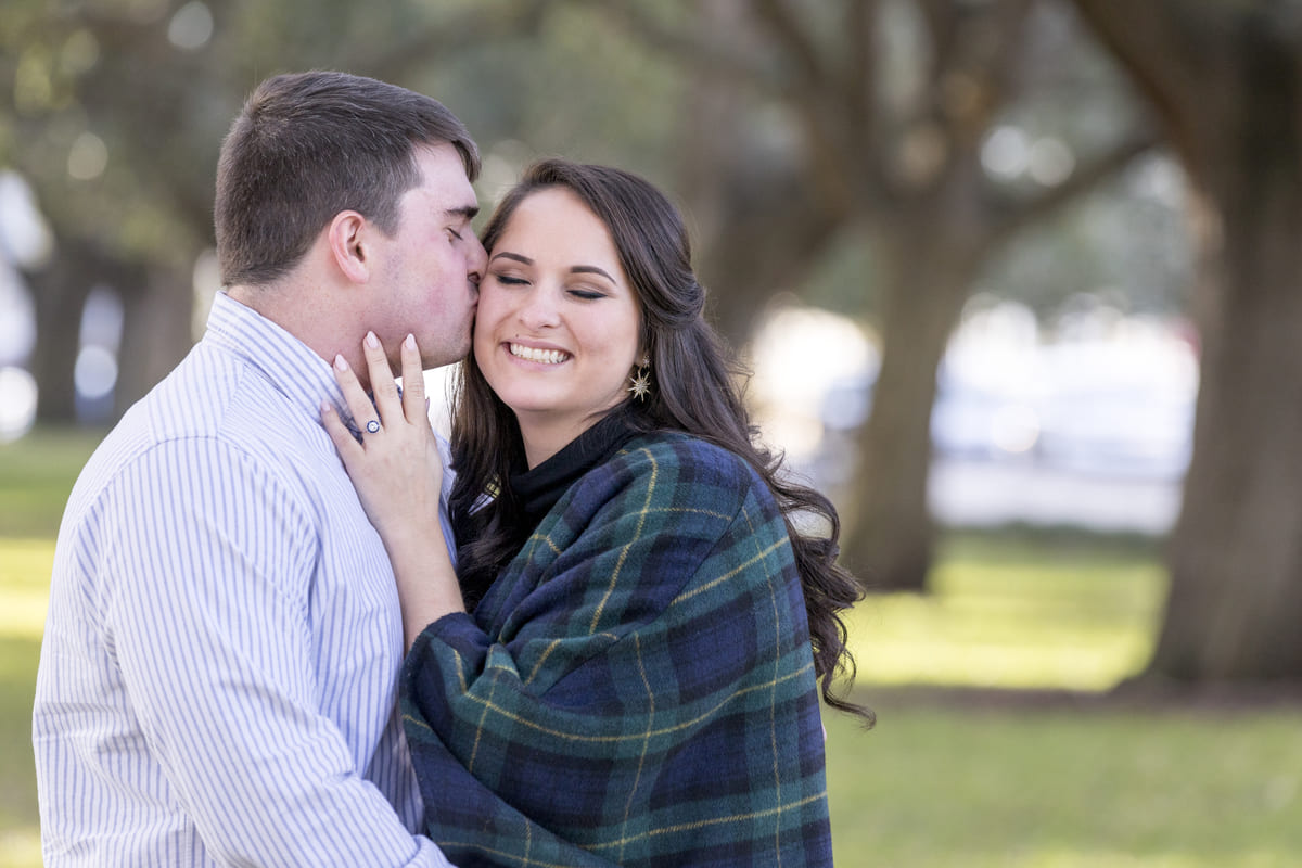 engaged couple portrait at white point garden charleston