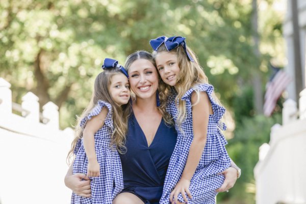 family photo charleston mother with two daughters wearing blue clothes