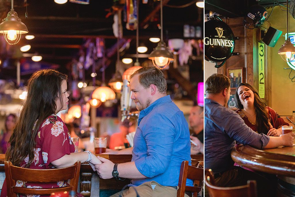 charleston engagement photographers at bar in charleston