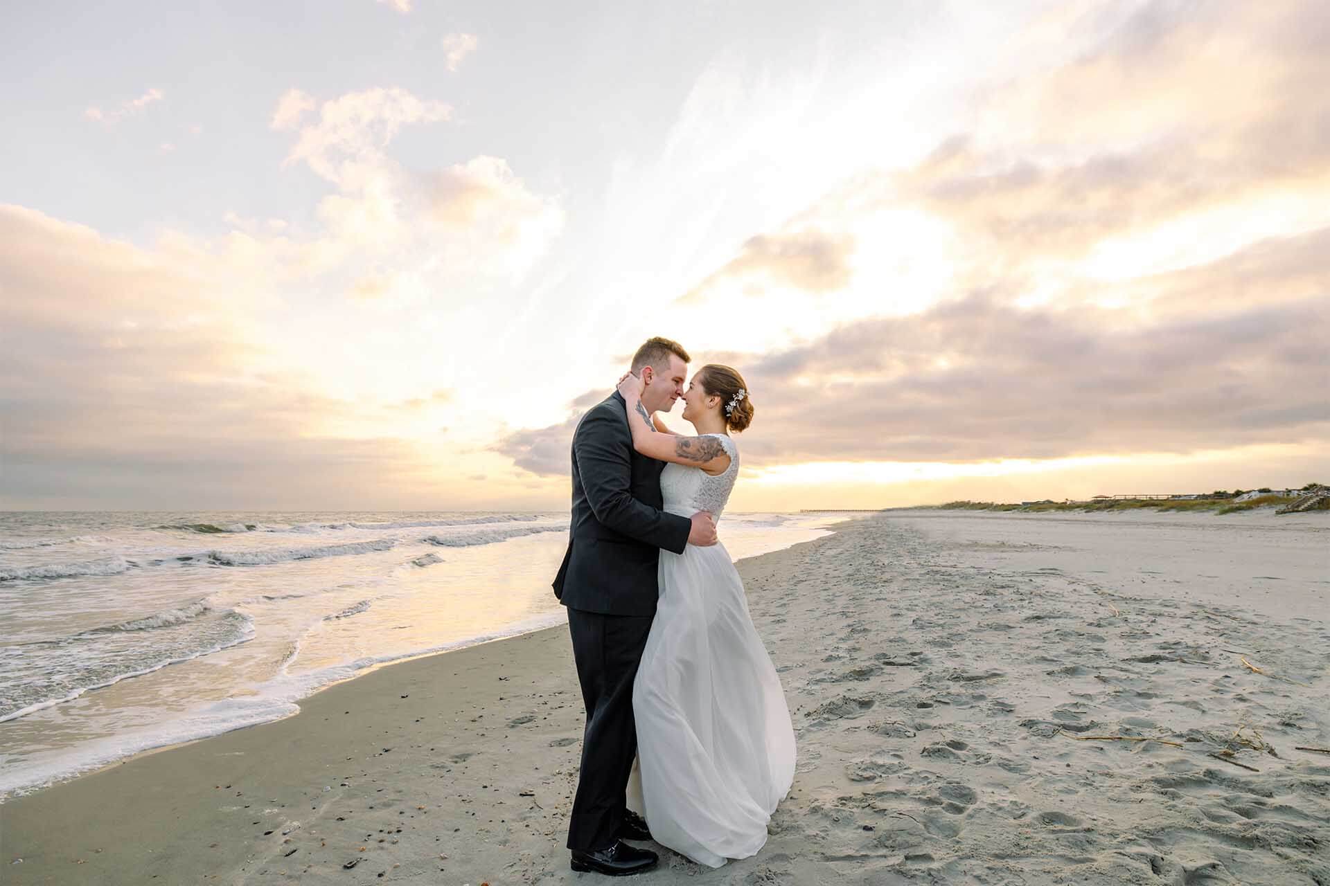 Lovely Elopement Couple at Isle of Palms Beach captured by Charleston Photo Art Photographers