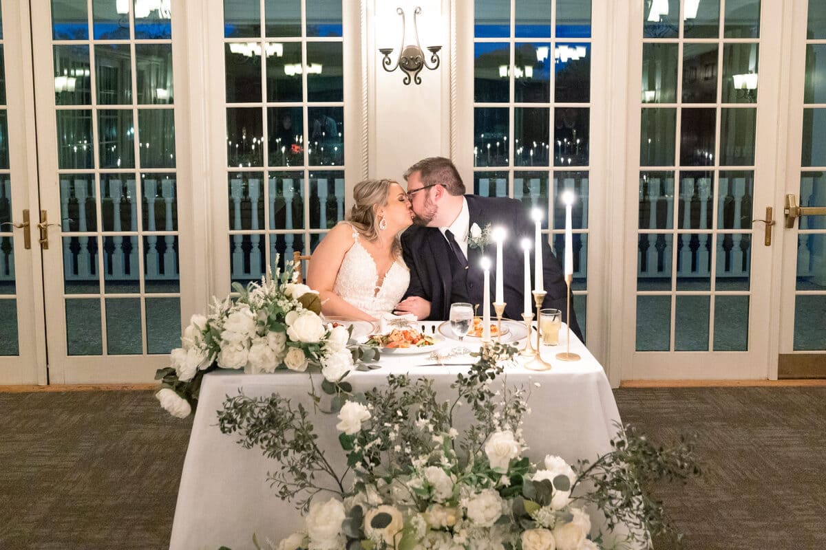 couple embrace charleston wedding dunes west