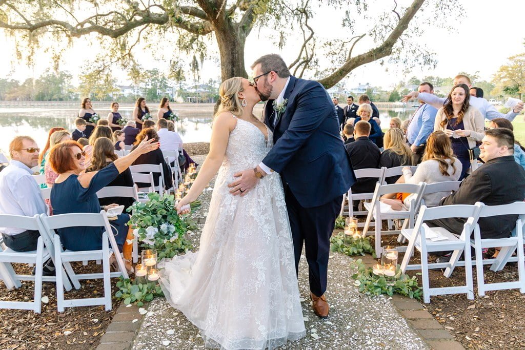 couple under trees dunes west charleston