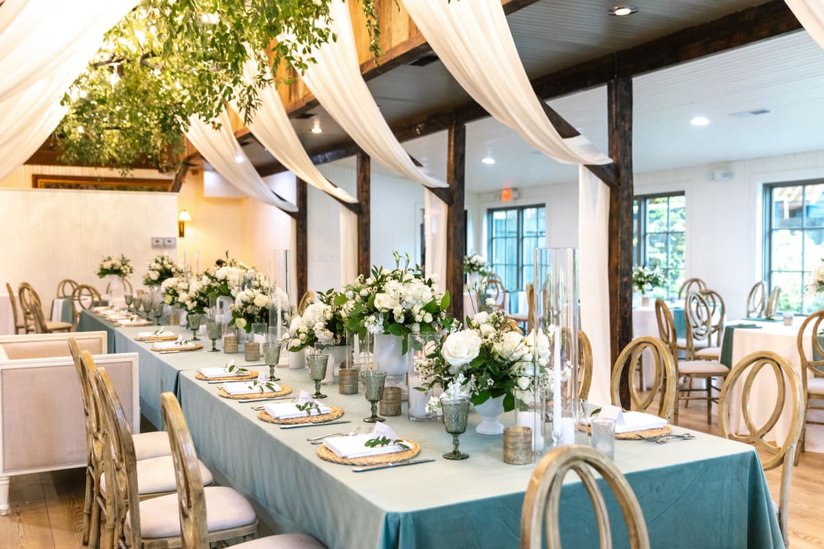 wedding chairs with white flowers