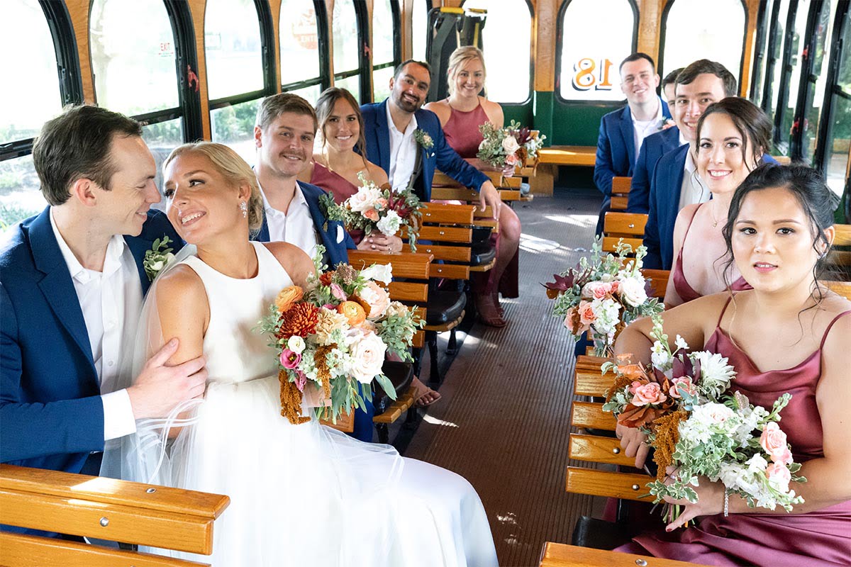 Charleston Wedding Photographer Bridal party inside trolley or limousine