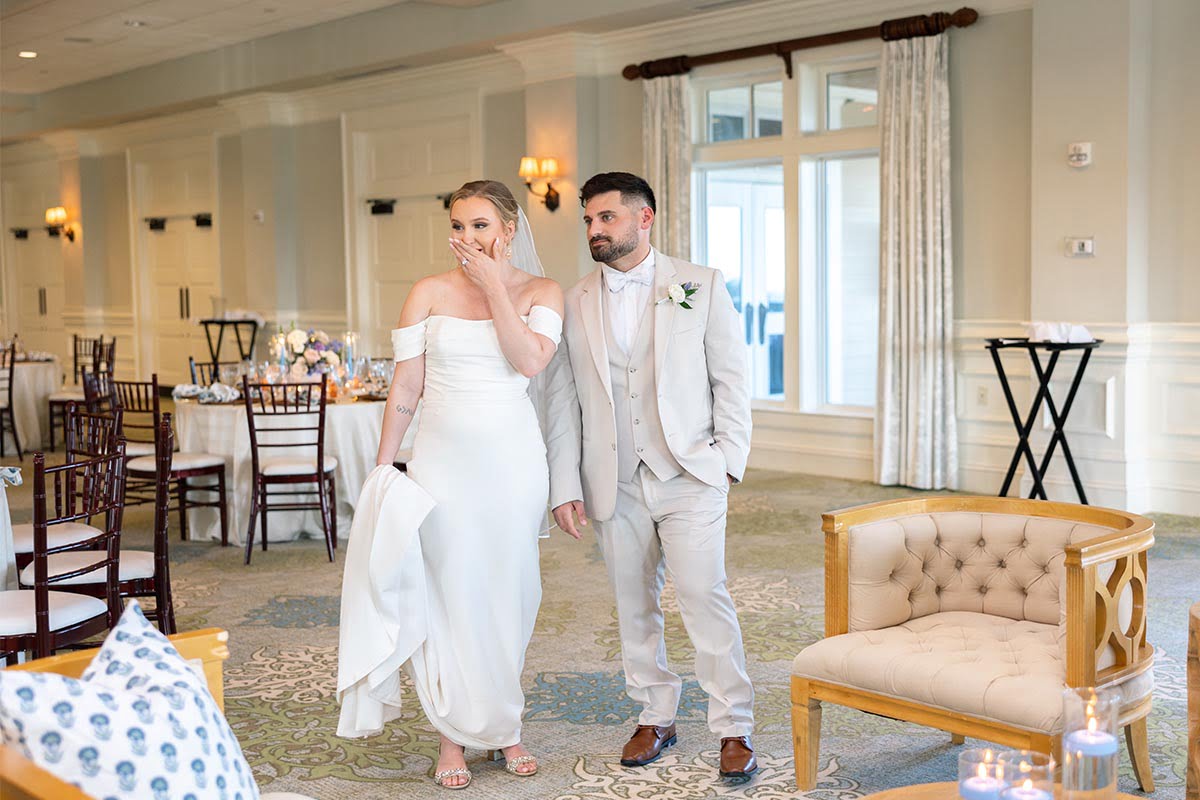 Charleston Wedding Photographer Bride and groom reaction for reception space