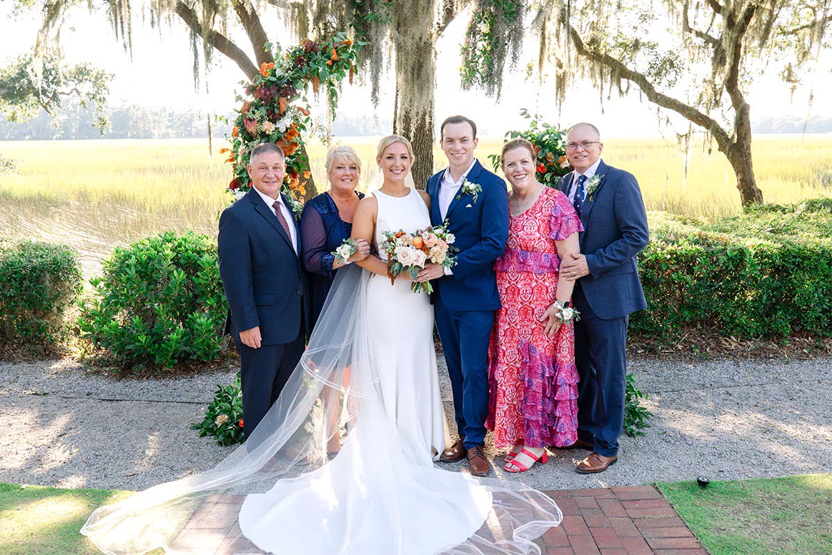 Charleston Wedding Photographer Bride and groom with parents (all together)