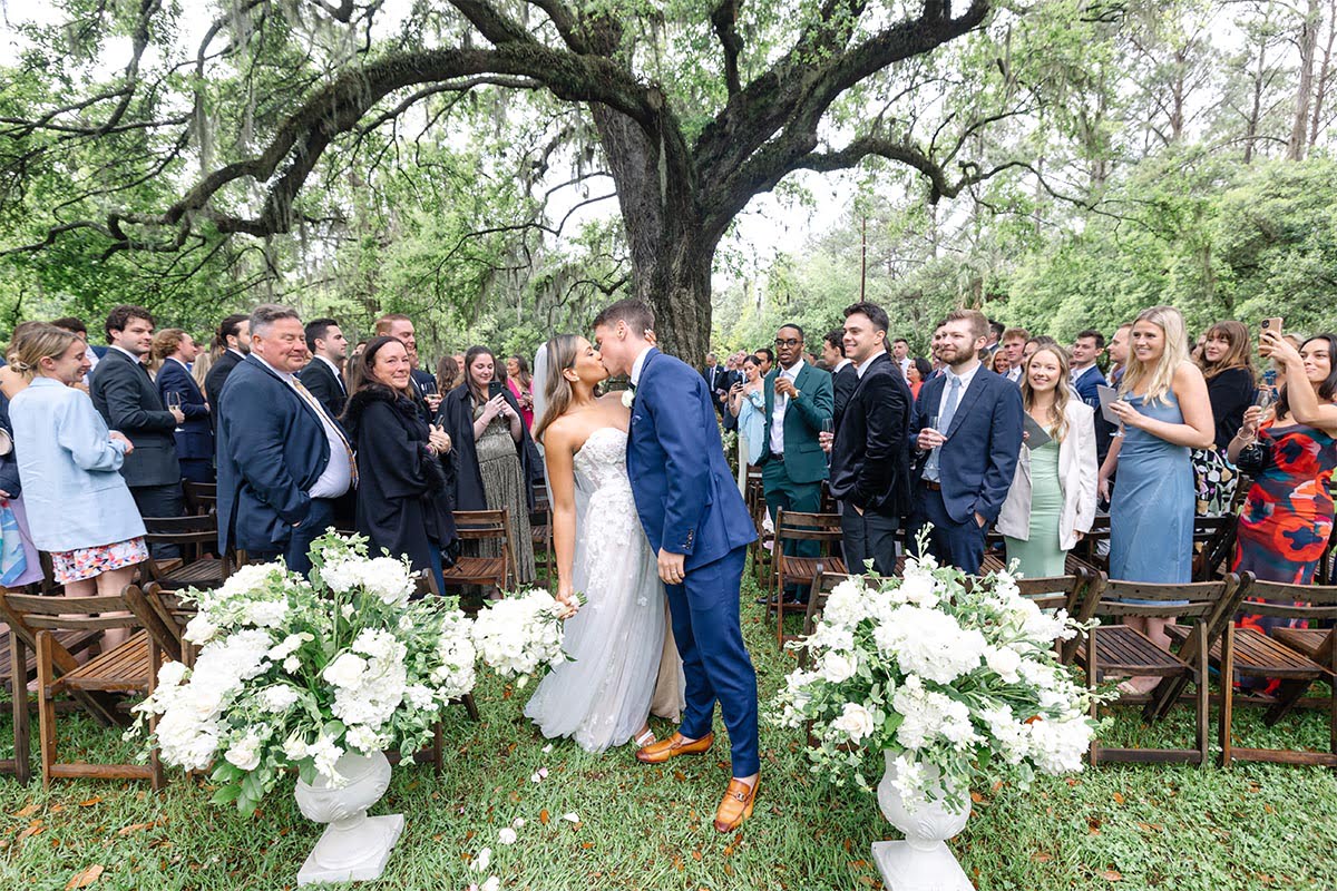 Charleston Wedding Photographer Groom Dipping Bride For Kiss