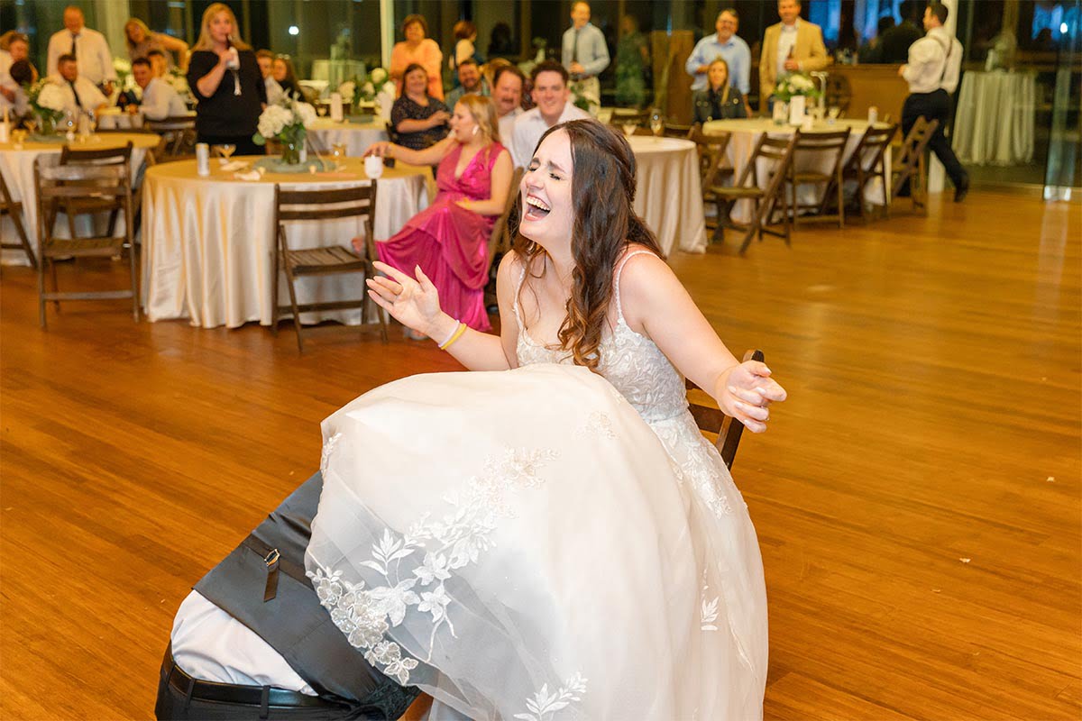 Charleston Wedding Photographer Reaction for removing the garter