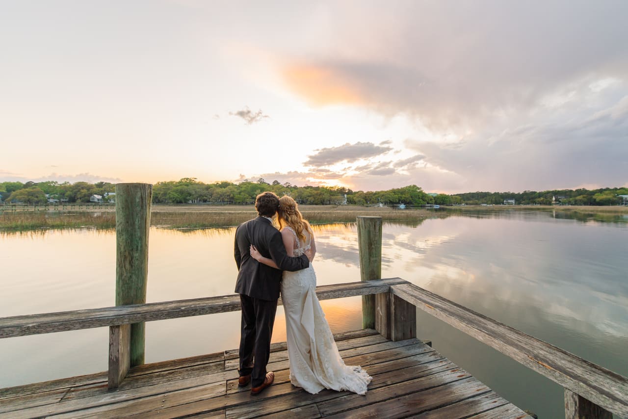 wedding boone hall bride groom sunset hugging