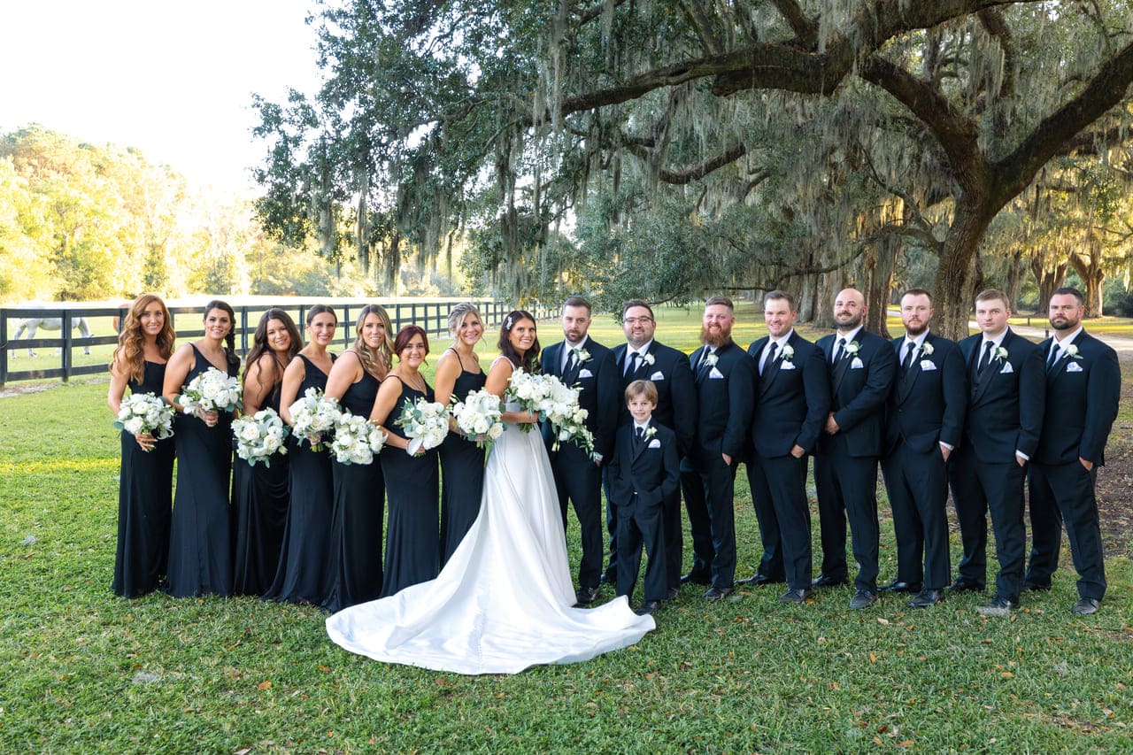 wedding boone hall plantation bride groom party under oaks
