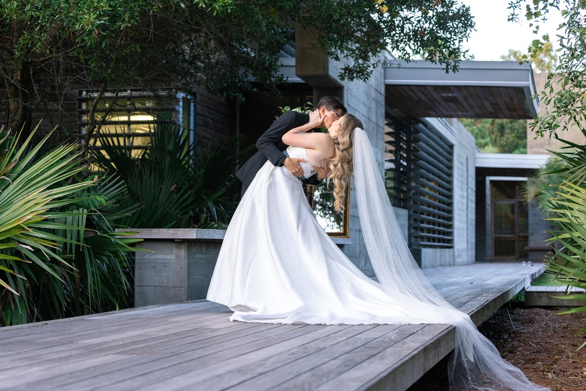 Founders hall wedding venue newlyweds kiss