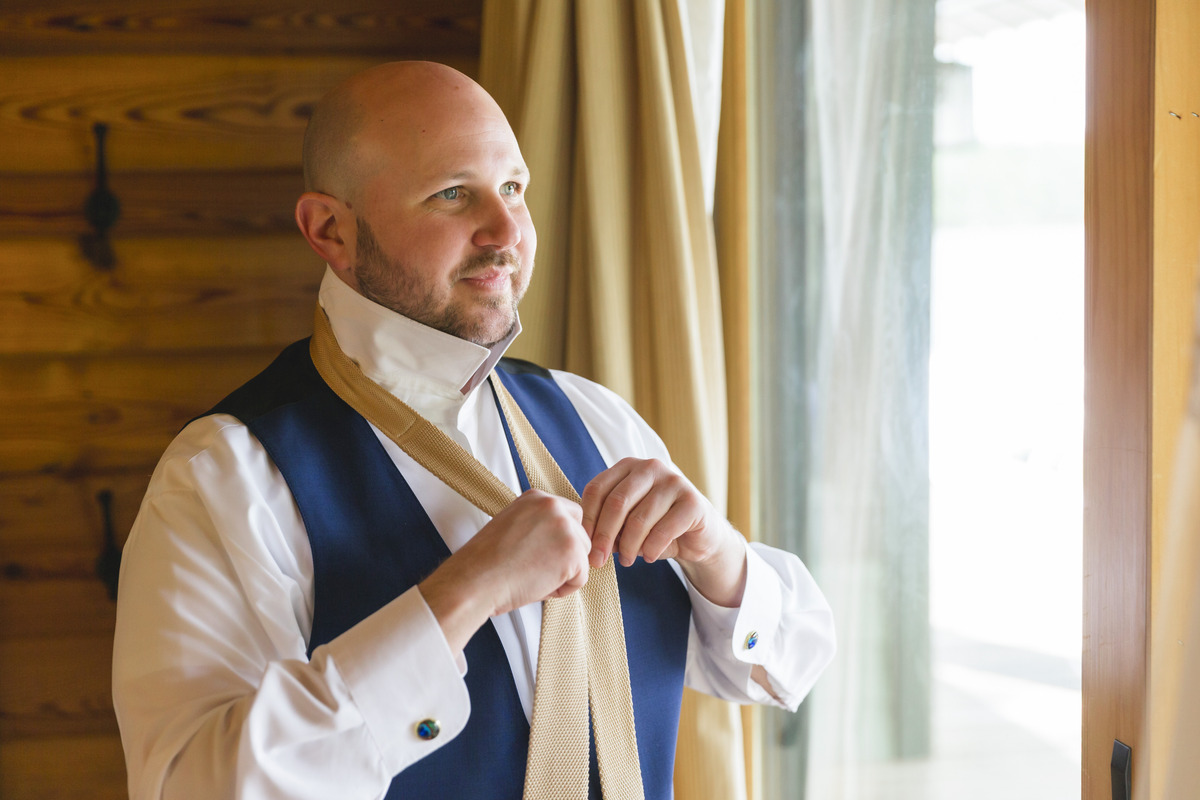 the Lake House at Bulow wedding venue groom getting ready