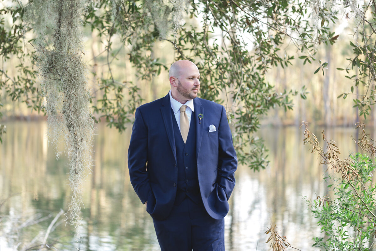 the Lake House at Bulow wedding venue groom portrait