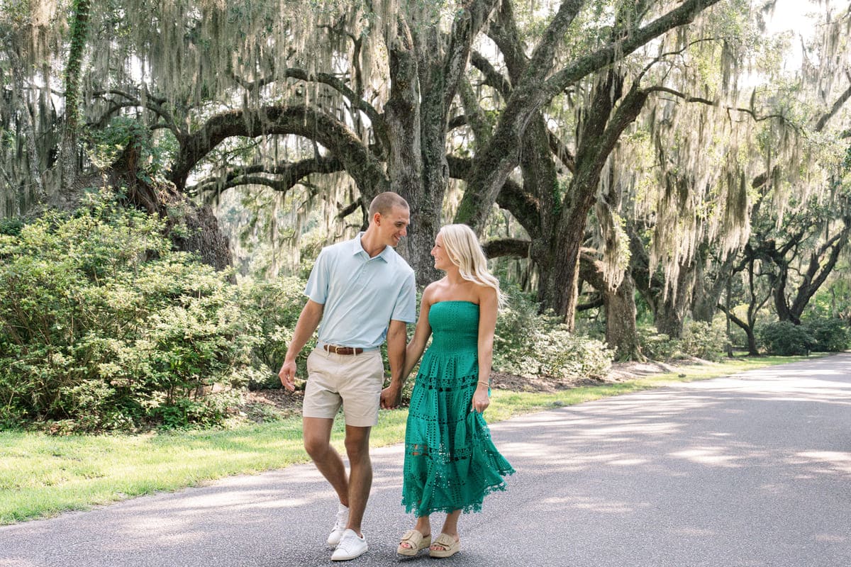 couple walking magnolia gardens