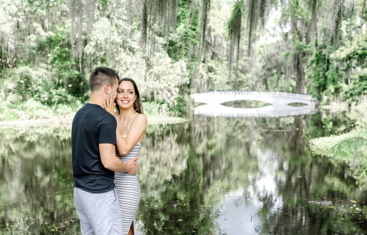 long white bridge proposal portrait