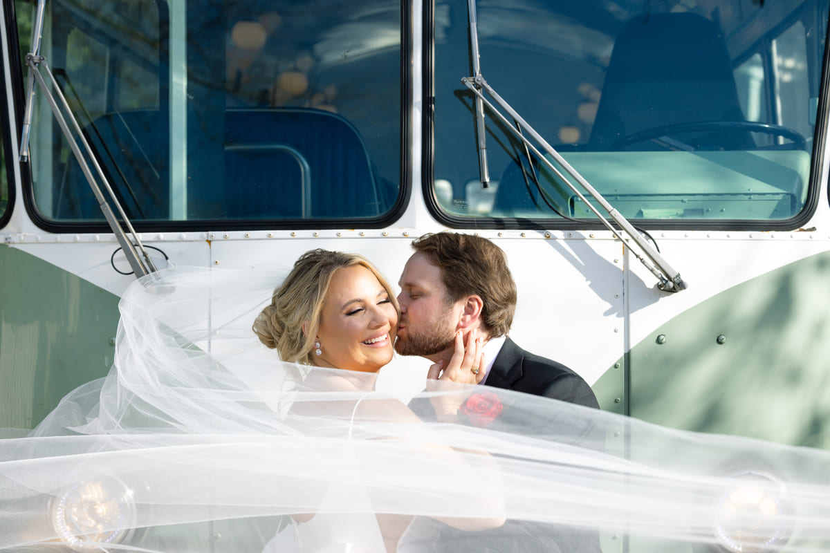 bride and groom with trolley charleston wedding