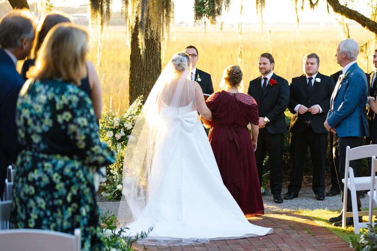 bride near the aisle creek club wedding