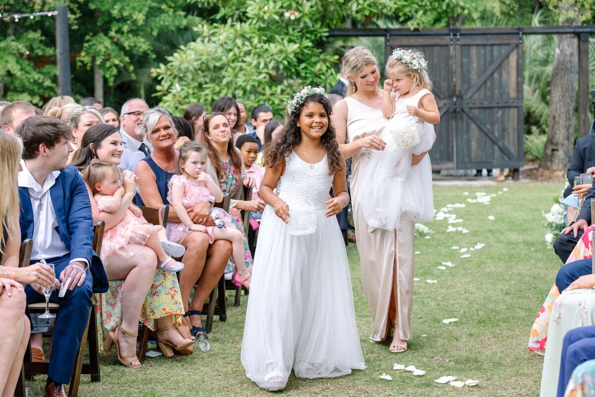 flower girl walking aisle charleston wedding