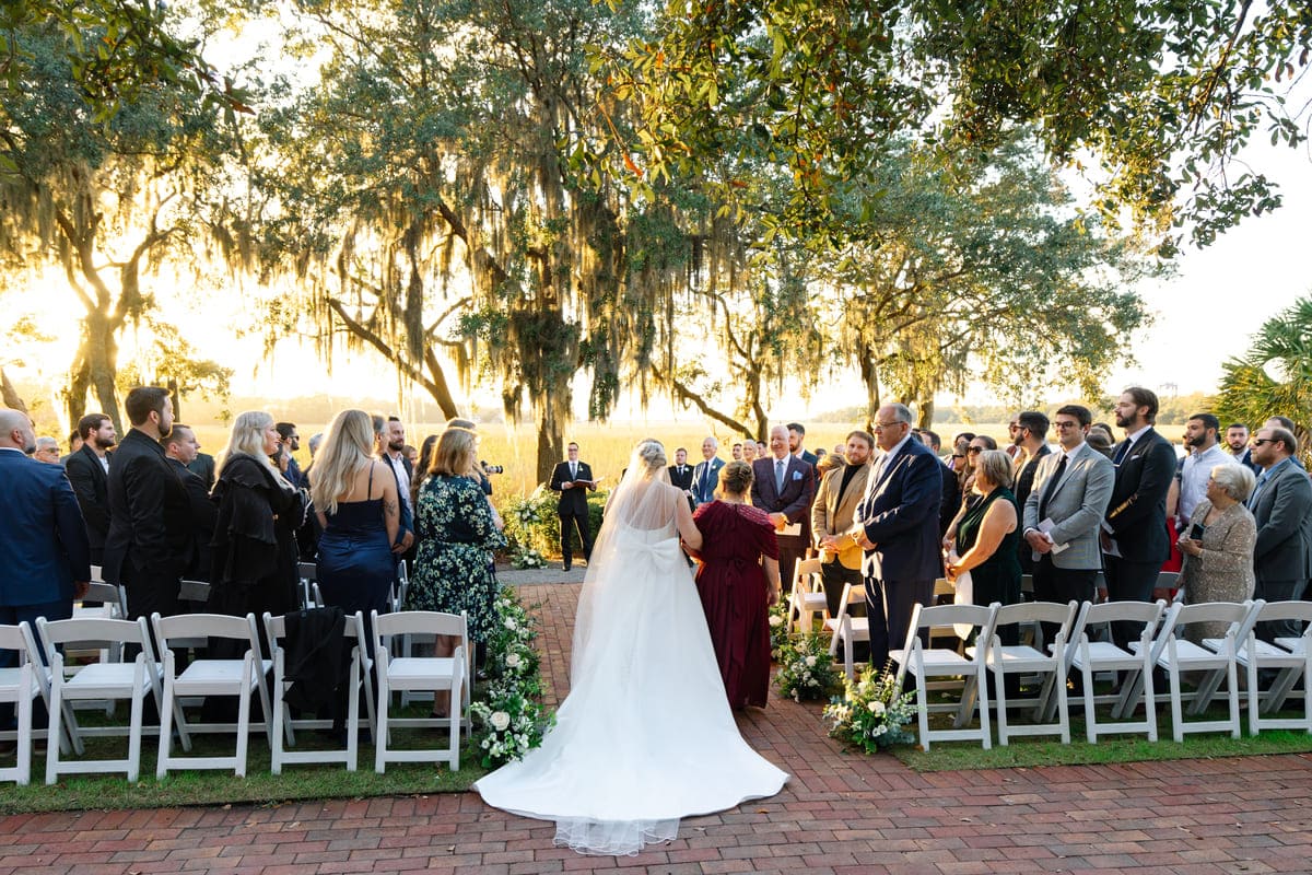 golden hour wedding ceremony creek club charleston