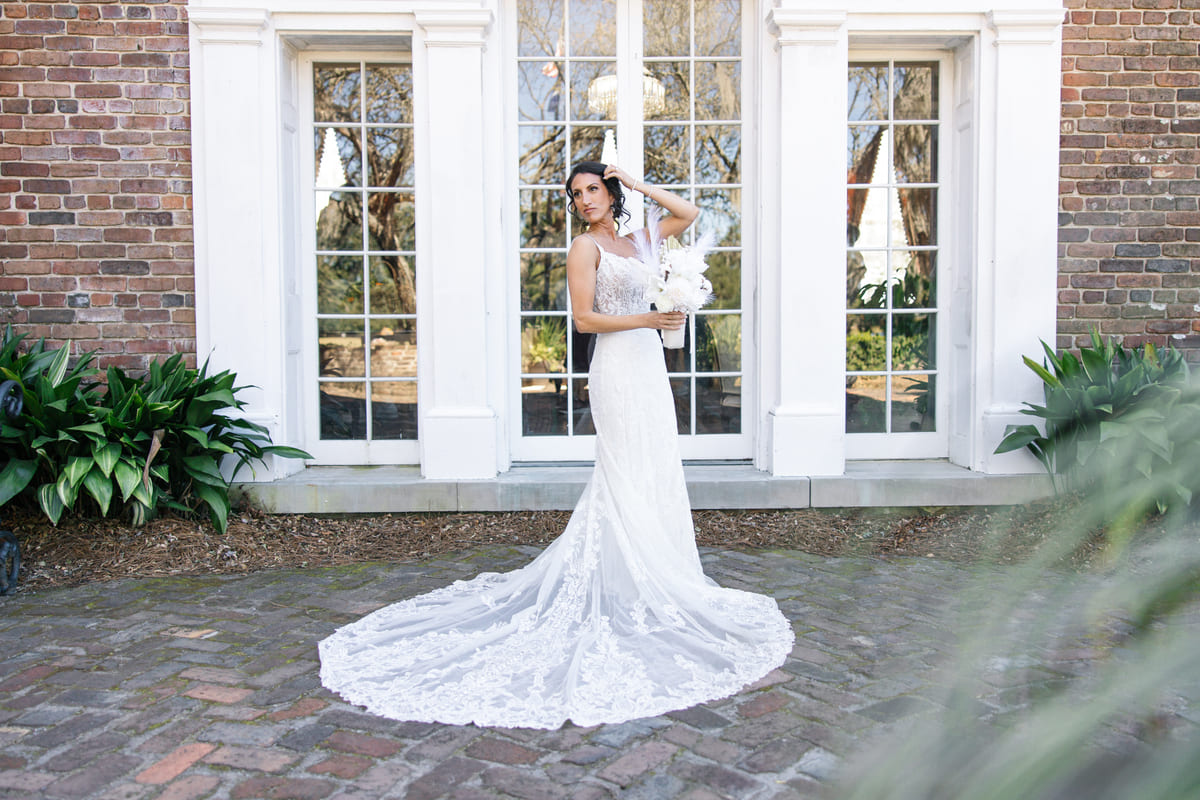 bride and groom walking wedding boone hall charleston photography