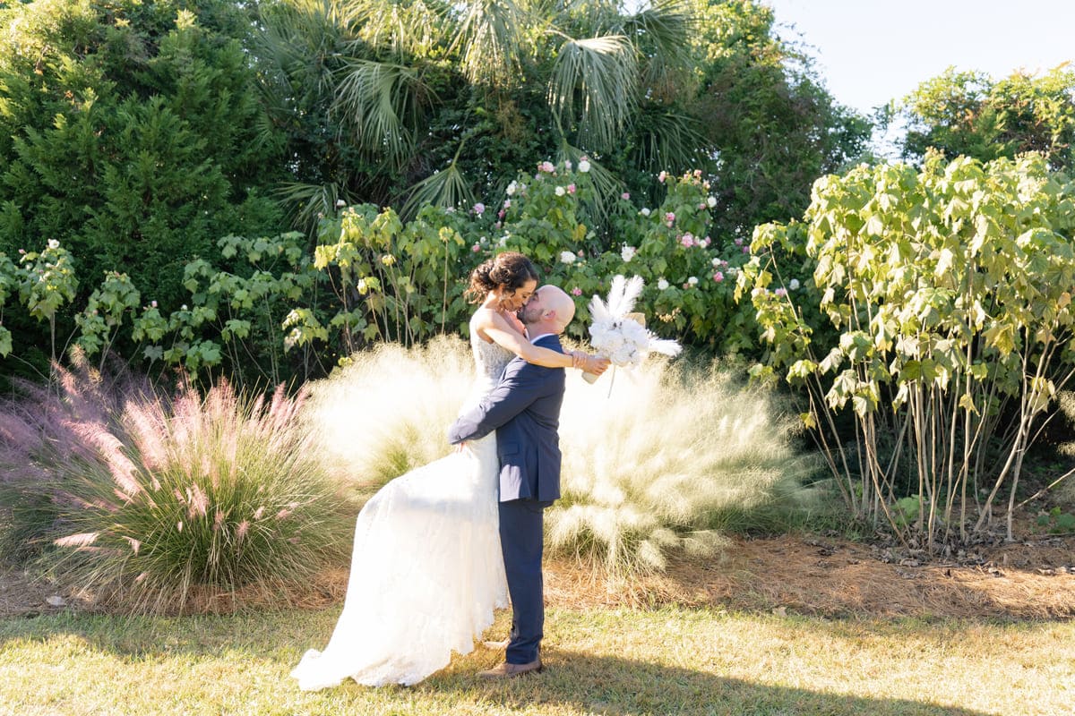 bride groom kiss wedding boone hall charleston photography