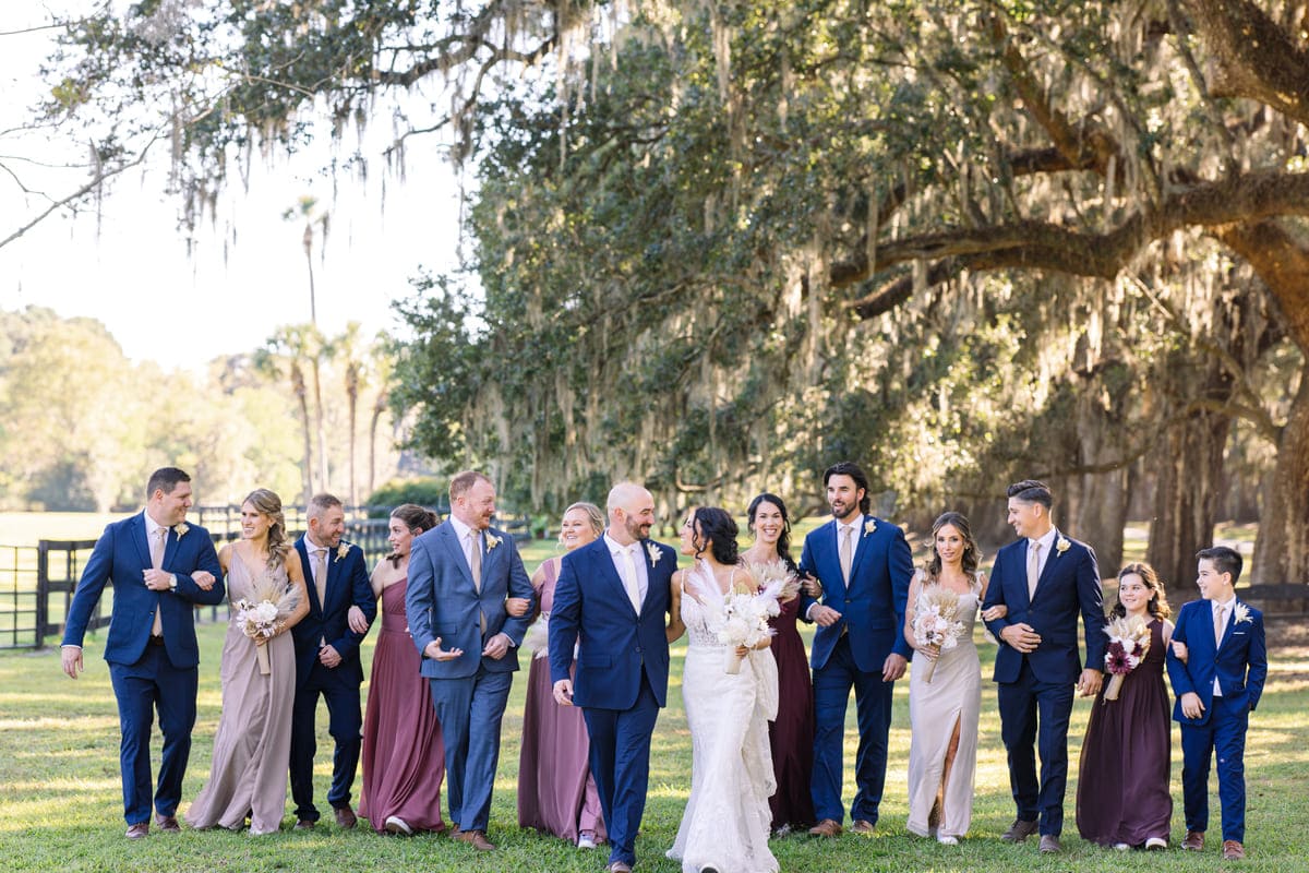 couple holding hands wedding boone hall charleston photography