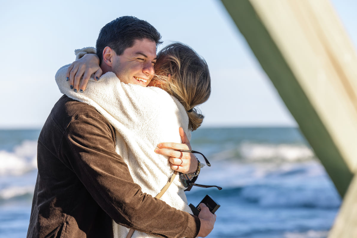 beautiful beach proposal at isle of palms pier
