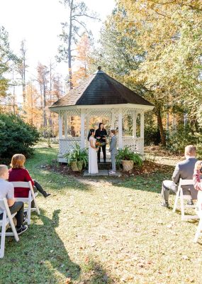 bride and bride first look cypress gardens