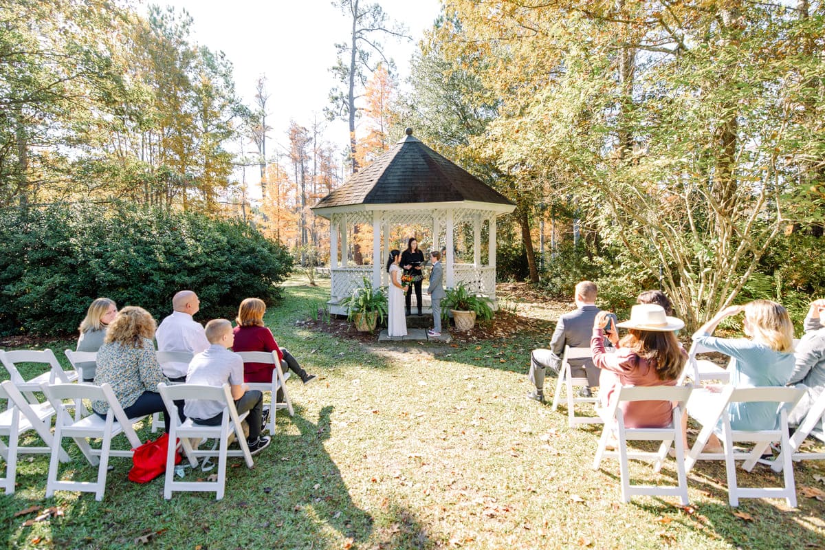 bride and bride first look cypress gardens