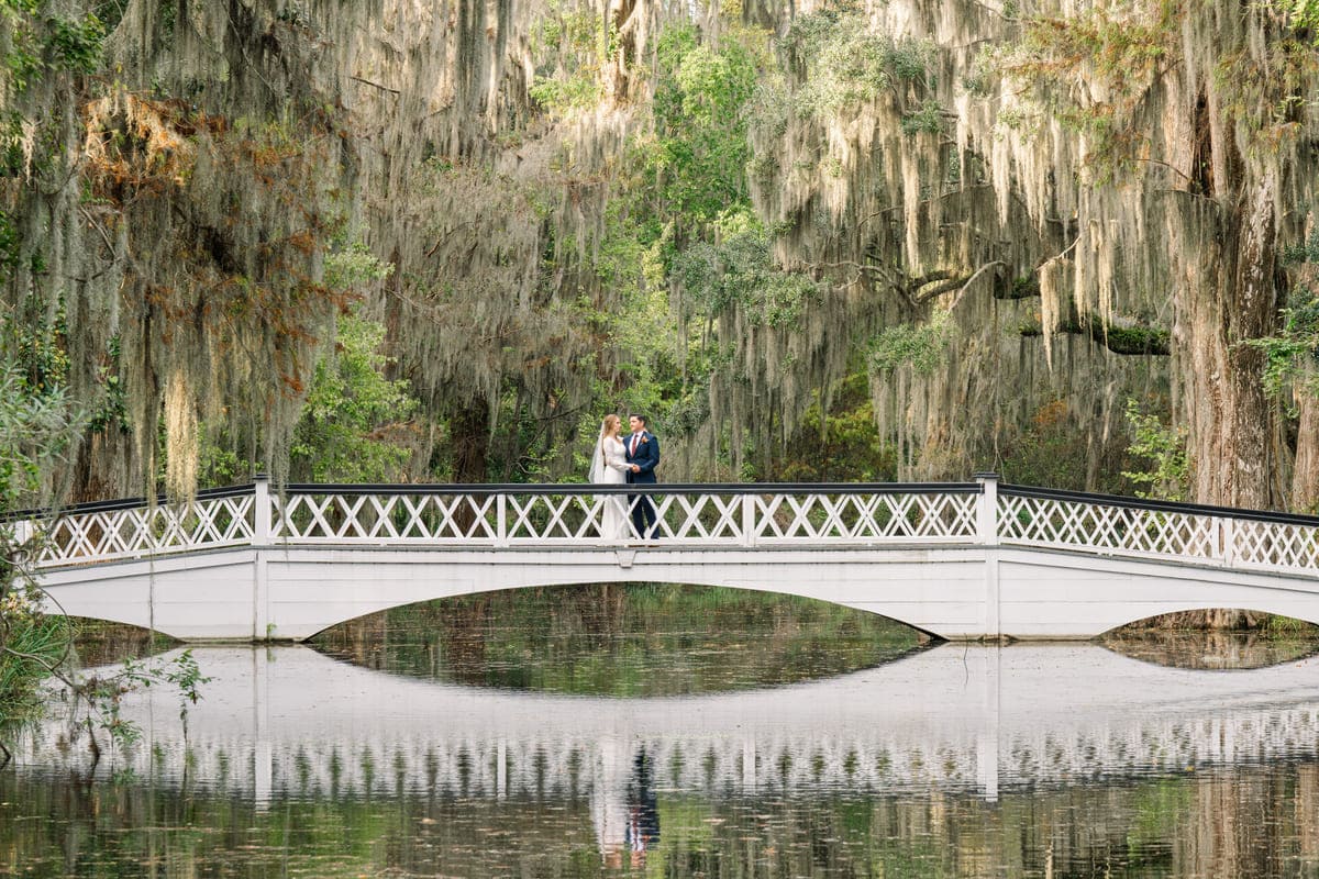 couple first look white bridge magnolia