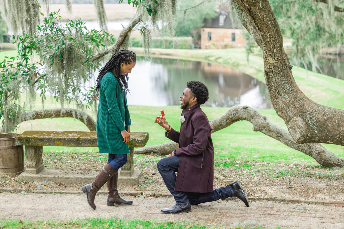 charleston secret proposal near the stone bench