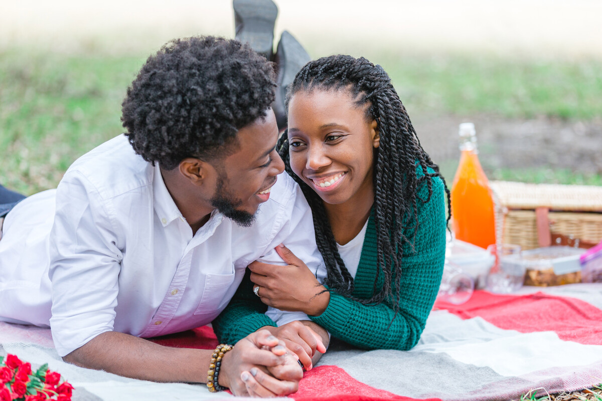 couple enjoying picnic at middleton place after proposal