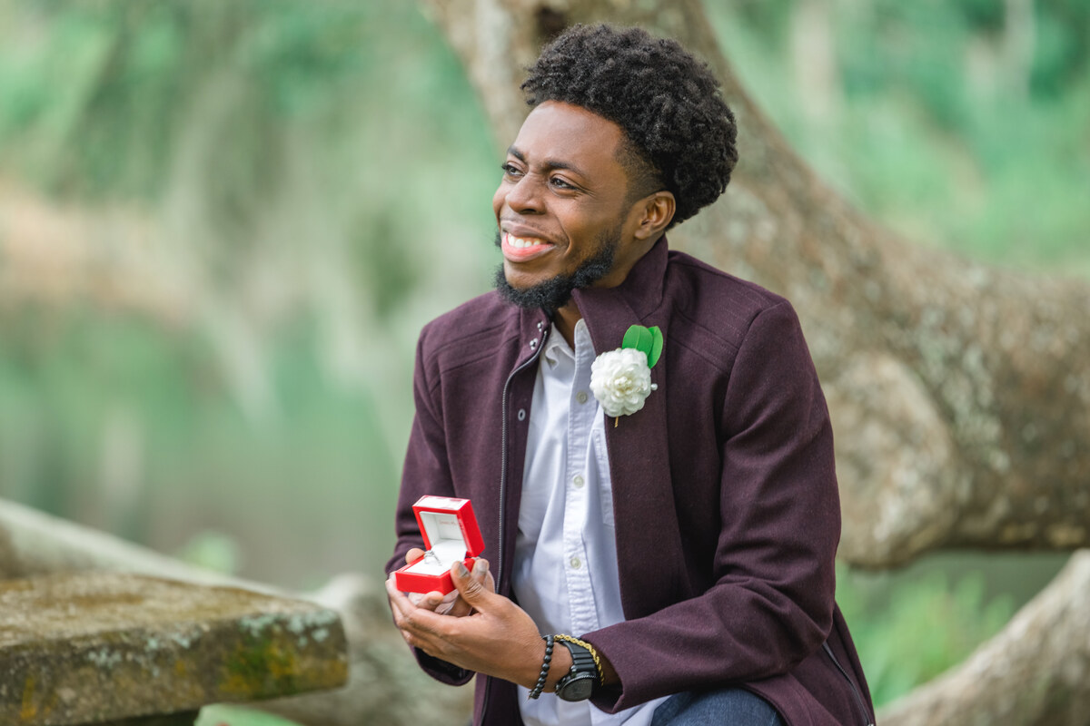 leroy with engagement ring charleston proposal photos