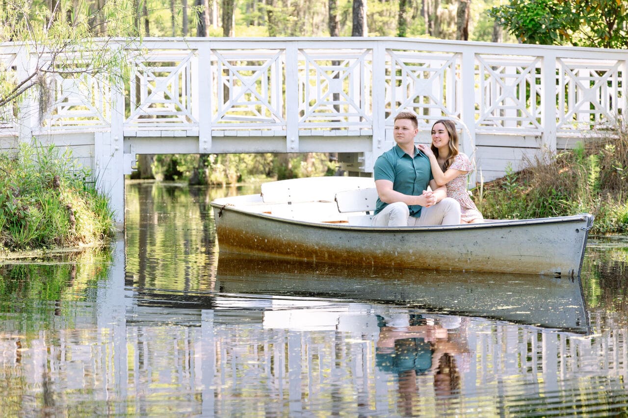cypress gardens proposal photographer boat and white bridge
